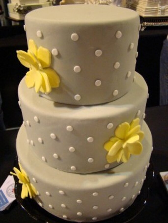 Gray wedding cake with yellow accents by Sweet Cakes by Rebecca