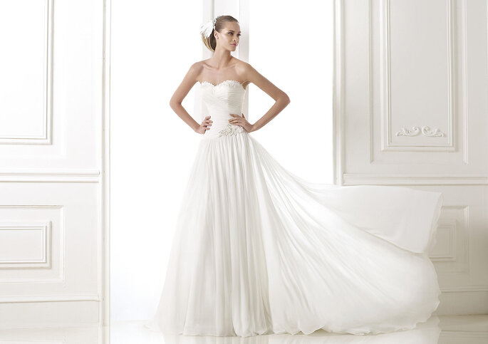 <a href="http://zankyou.9nl.de/n3ig" target="_blank"> Faça a sua marcação para experimentar este vestido! </a>
