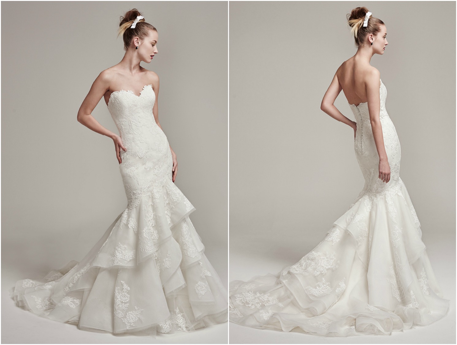 Lace motifs add sophisticated elegance to this fit and flare wedding dress, featuring a strapless sweetheart neckline and layered Fallow organza skirt and train. Complete with crystal buttons over zipper and inner corset closure. Also available, an illusion lace bodysuit with three-quarter length sleeves. Bodysuit sold separately.
<a href="https://www.maggiesottero.com/sottero-and-midgley/moriah/9872" target="_blank">Sottero & Midgley</a>