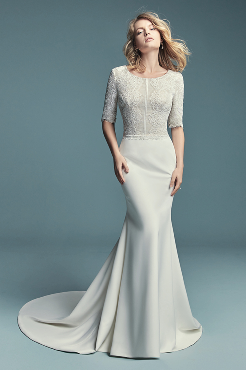<a href="https://www.maggiesottero.com/maggie-sottero/edalene/11468">Maggie Sottero</a>
Este vestido de noiva modesto e com mangas, confecionado por renda e com um decote em forma de U. Terminado com fecho.