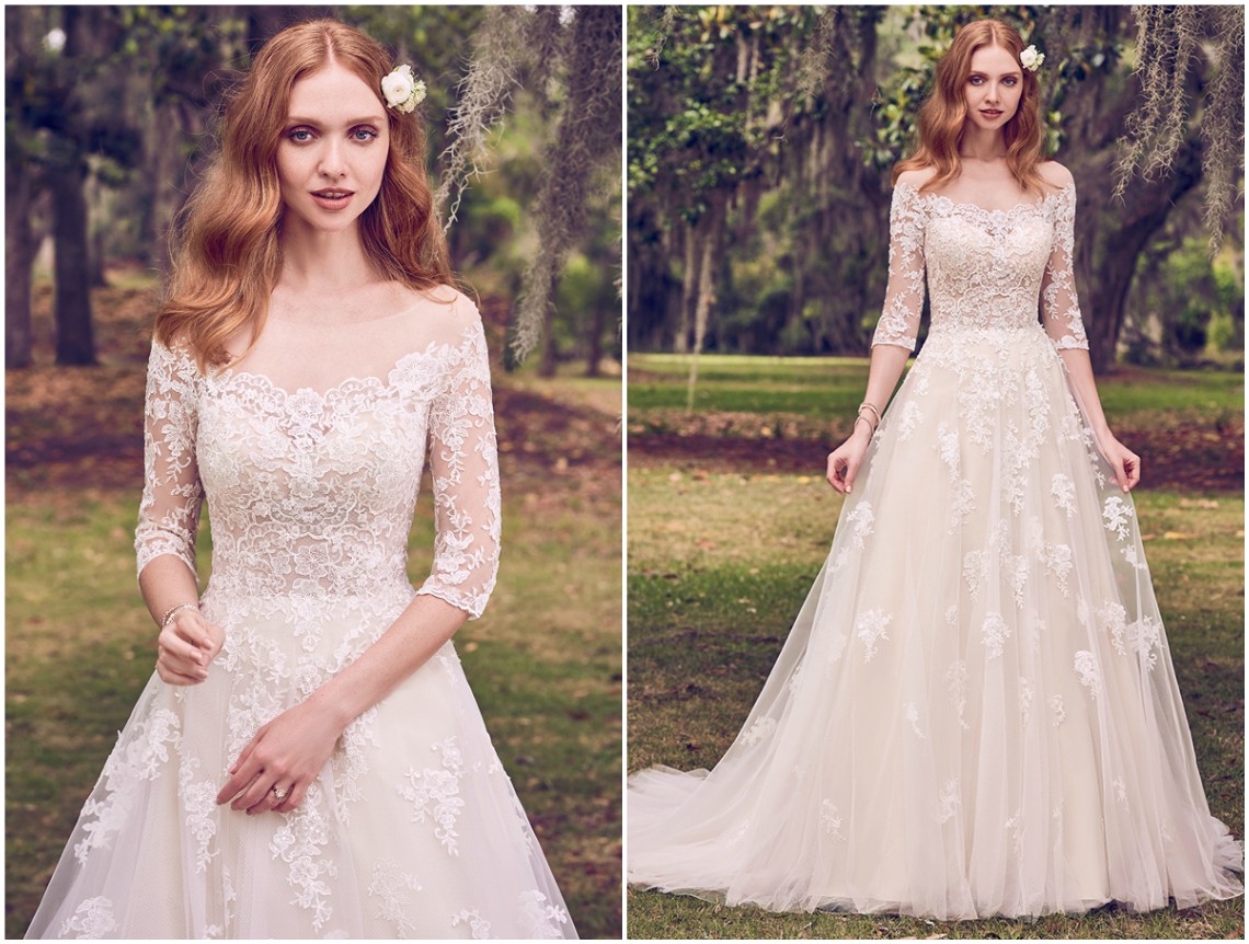 Românticos motivos de renda sobre tule vestido off-the-shoulder e linha A. A renda completa as transparências no decote, nas meias-mangas e costas. Acabamentos com botões forrados sobre fecho zíper. <a href="https://www.maggiesottero.com/maggie-sottero/bree/11160?utm_source=zankyou&utm_medium=gowngallery" target="_blank">Maggie Sottero</a>