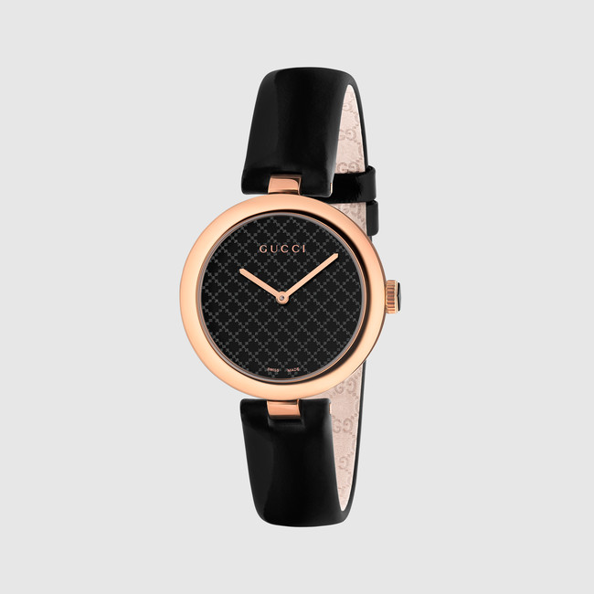 Relógio por Gucci
