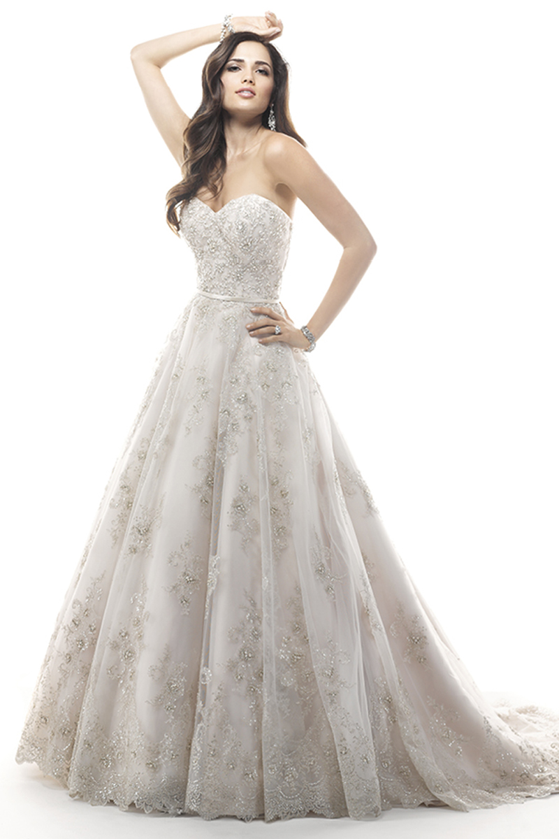 Apaixone-se por este vestido com efeito balão com pormenores de renda bordados delicadamente neste tule com cristais Swarovski. 
<a href="http://www.maggiesottero.com/dress.aspx?style=4MS901" target="_blank">Maggie Sottero</a>
