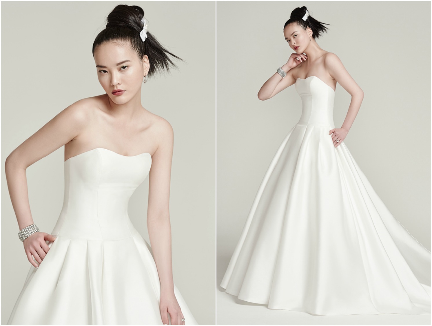 Incredibly chic, this unembellished Vizela mikado ball gown, with fitted bodice and natural waist, flares into a dramatically full structured A-line skirt with hidden pockets. Finished with covered buttons trailing from neckline to hemline over zipper and inner corset closure.
<a href="https://www.maggiesottero.com/sottero-and-midgley/prestyn/9878" target="_blank">Sottero & Midgley</a>
