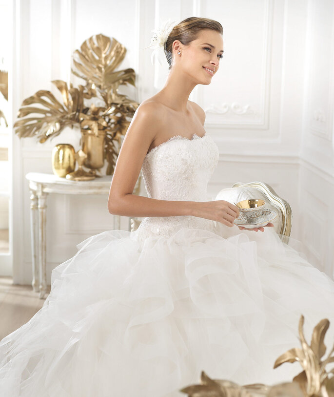 <a href="http://zankyou.9nl.de/n3ig" target="_blank"> Faça a sua marcação para experimentar este vestido! </a>