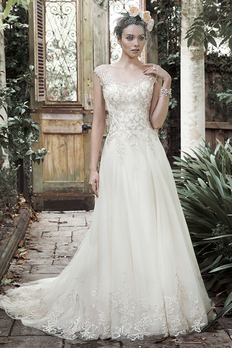 <a href="http://www.maggiesottero.com/dress.aspx?style=5MR709" target="_blank">Maggie Sottero</a>

