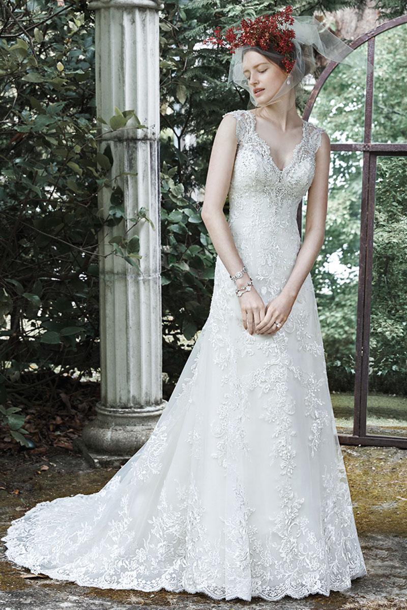 <a href="http://www.maggiesottero.com/dress.aspx?style=5MS702" target="_blank">Maggie Sottero</a>

