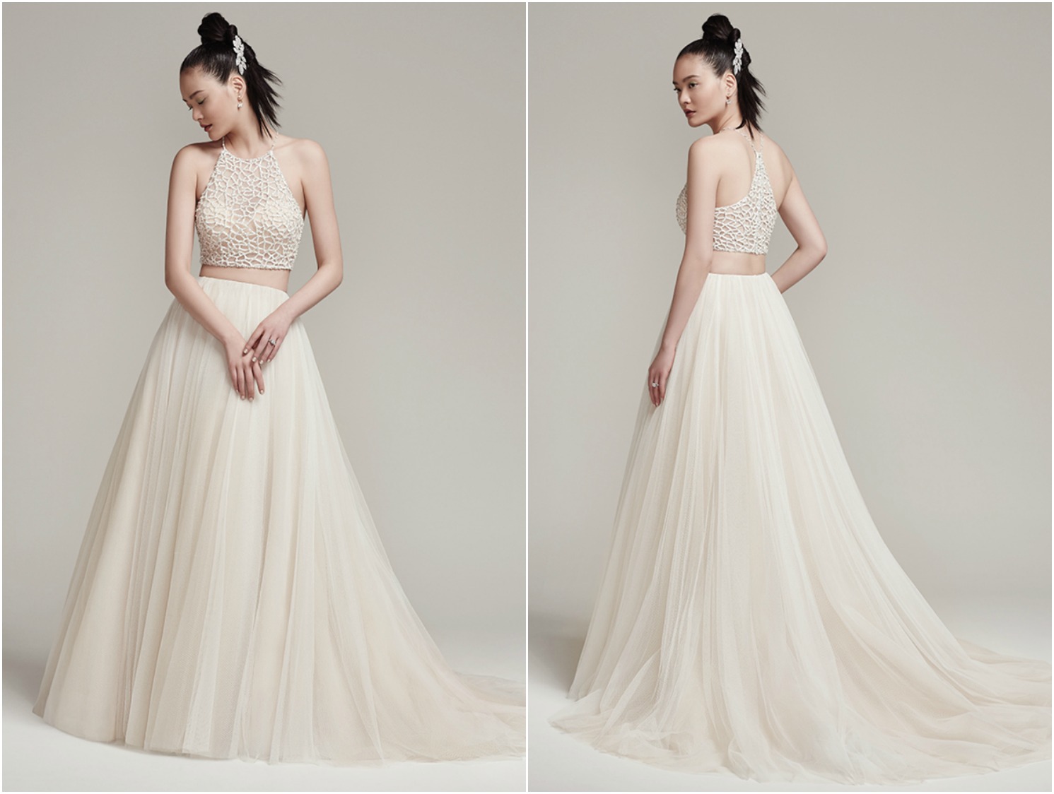 Sophisticated bead encrusted cropped halter with crystal button closure and bandeau lining. Full tulle A-line skirt with zipper closure.
<a href="https://www.maggiesottero.com/sottero-and-midgley/jude-shardea/9965" target="_blank">Sottero & Midgley</a>