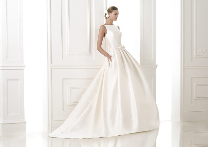 <a href="http://zankyou.9nl.de/n3ig" target="_blank"> Faça a sua marcação para experimentar este vestido! </a>