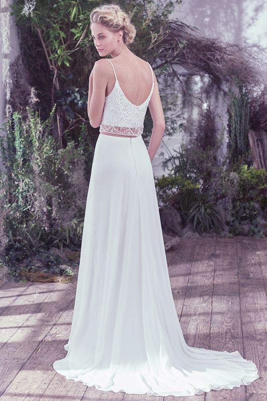 <a href="https://www.zankyou.pt/f/maggie-sottero-421730" target="_blank"> Maggie Sottero </a>