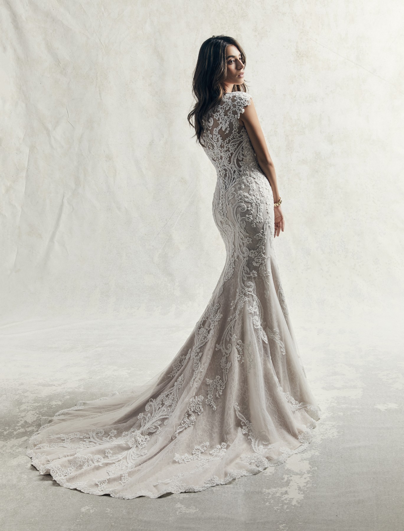 <a href="https://www.maggiesottero.com/sottero-and-midgley/vivian/11866">Vivian</a> Credits: Sottero &amp; Midgley.