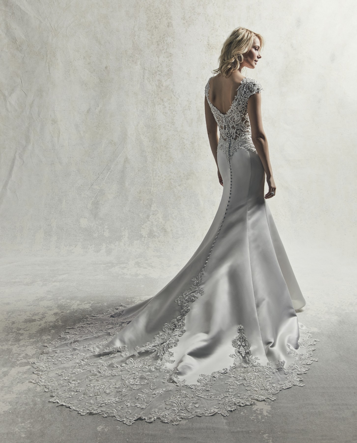 <a href="https://www.maggiesottero.com/sottero-and-midgley/gibson/11850">Gibson</a> Credits: Sottero & Midgley.