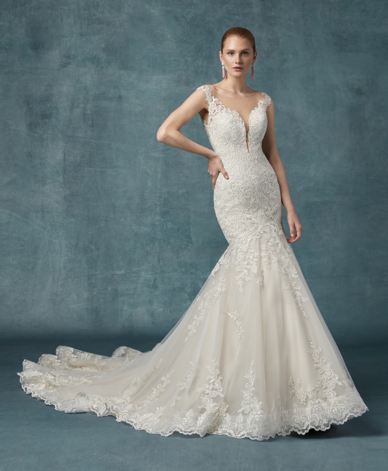 <a href="https://www.maggiesottero.com/maggie-sottero/constance/11774">Constance</a> Credits: Maggie Sottero.