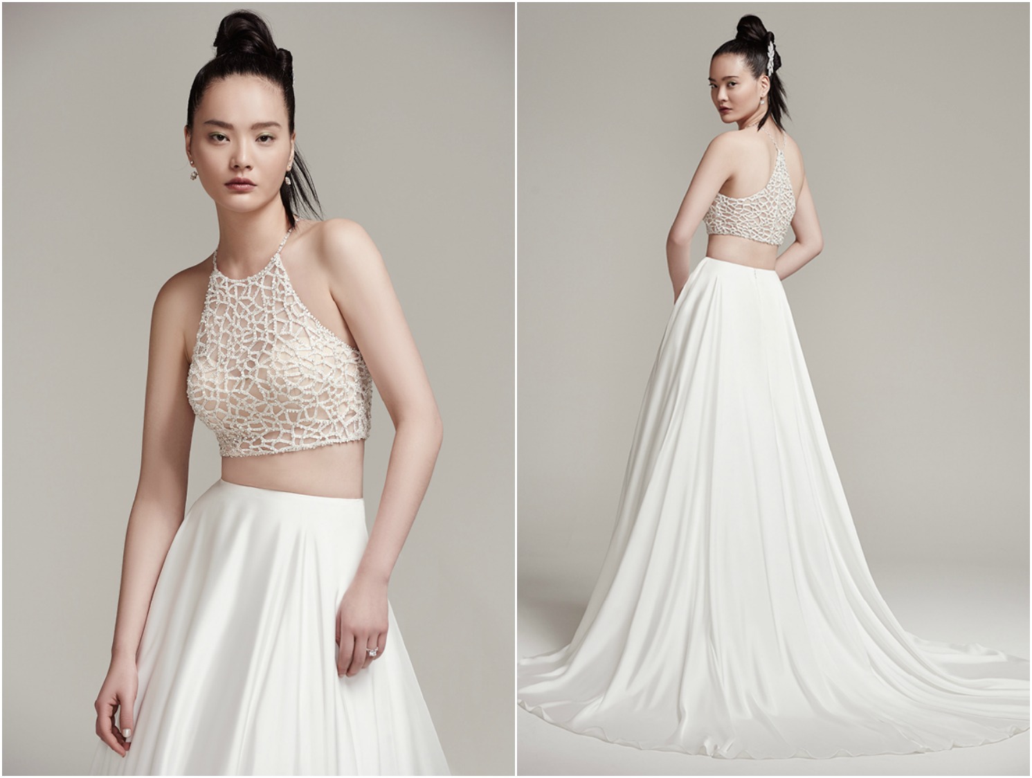 Sophisticated bead encrusted cropped halter with crystal button closure and bandeau lining. Inessa satin A-line skirt with zipper closure.
<a href="https://www.maggiesottero.com/sottero-and-midgley/jude-aviana/9966" target="_blank">Sottero & Midgley</a>