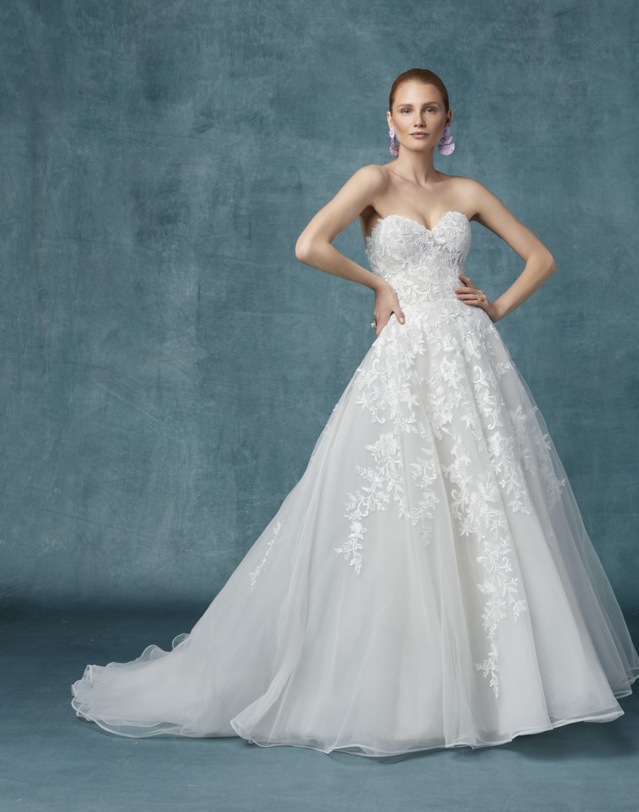 <a href="https://www.maggiesottero.com/maggie-sottero/kathleen/11796">Kathleen</a> Credits: Maggie Sottero.