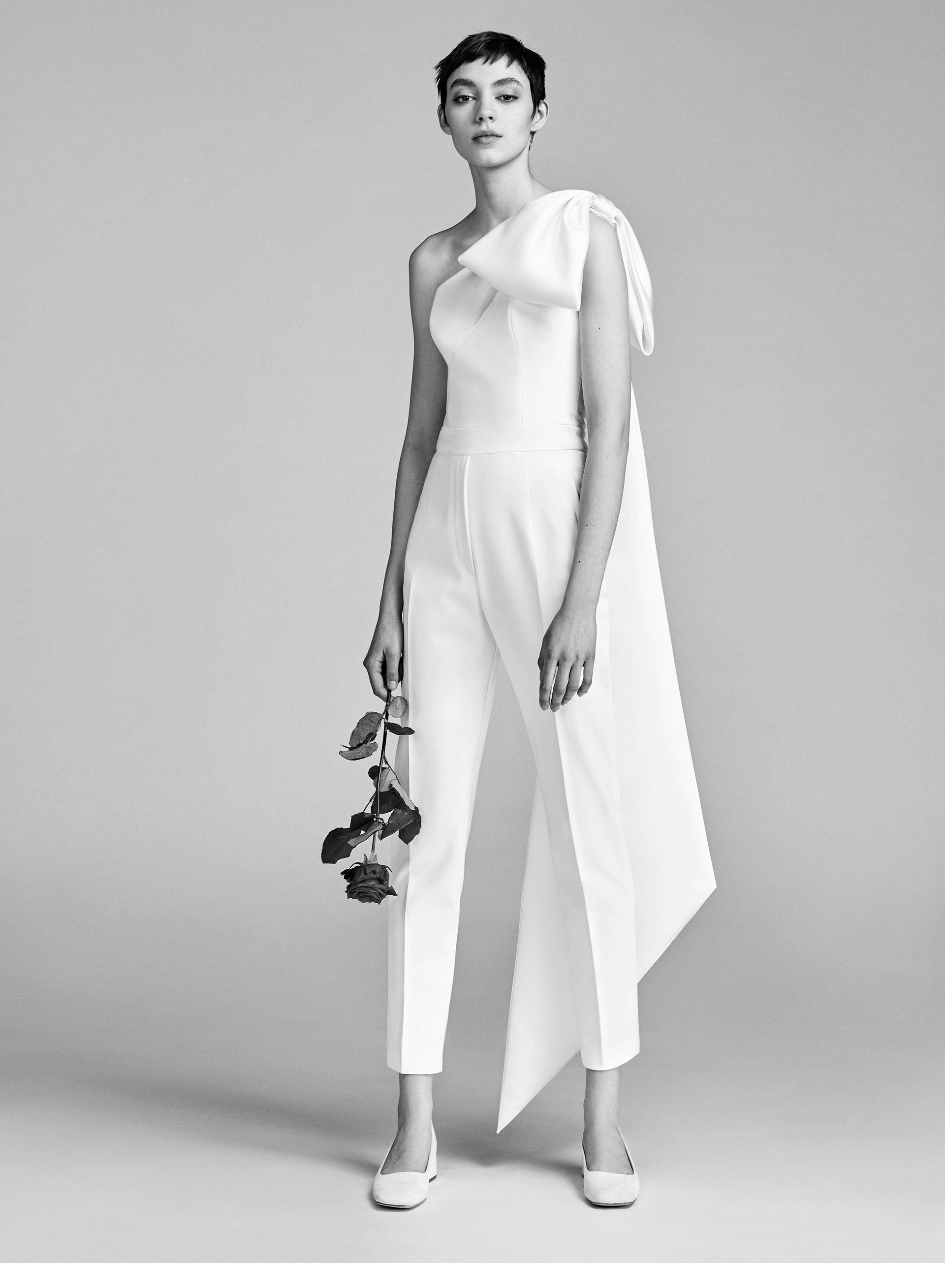One Shoulder Bow Jumpsuit. Credits: Viktor and Rolf