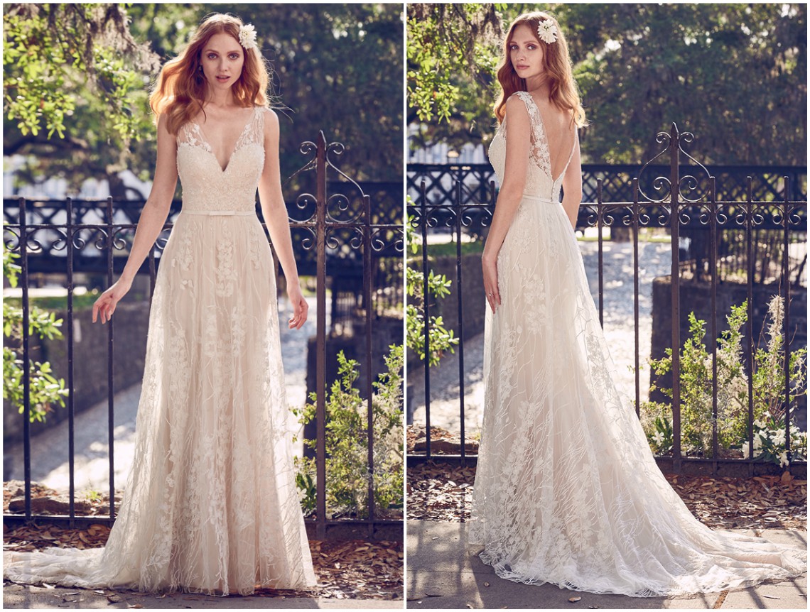 Vestido de noiva composto por leves camadas de tule e motivos de renda com pedraria sobre a silhueta. Decote coração, alças transparentes e um decote em V nas costas acentuado por rendas e rematado com um cinto. Acabamentos com botões forrados sobre fecho zíper.
<a href="https://www.maggiesottero.com/maggie-sottero/belecia/11154?utm_source=zankyou&utm_medium=gowngallery" target="_blank">Maggie Sottero</a>