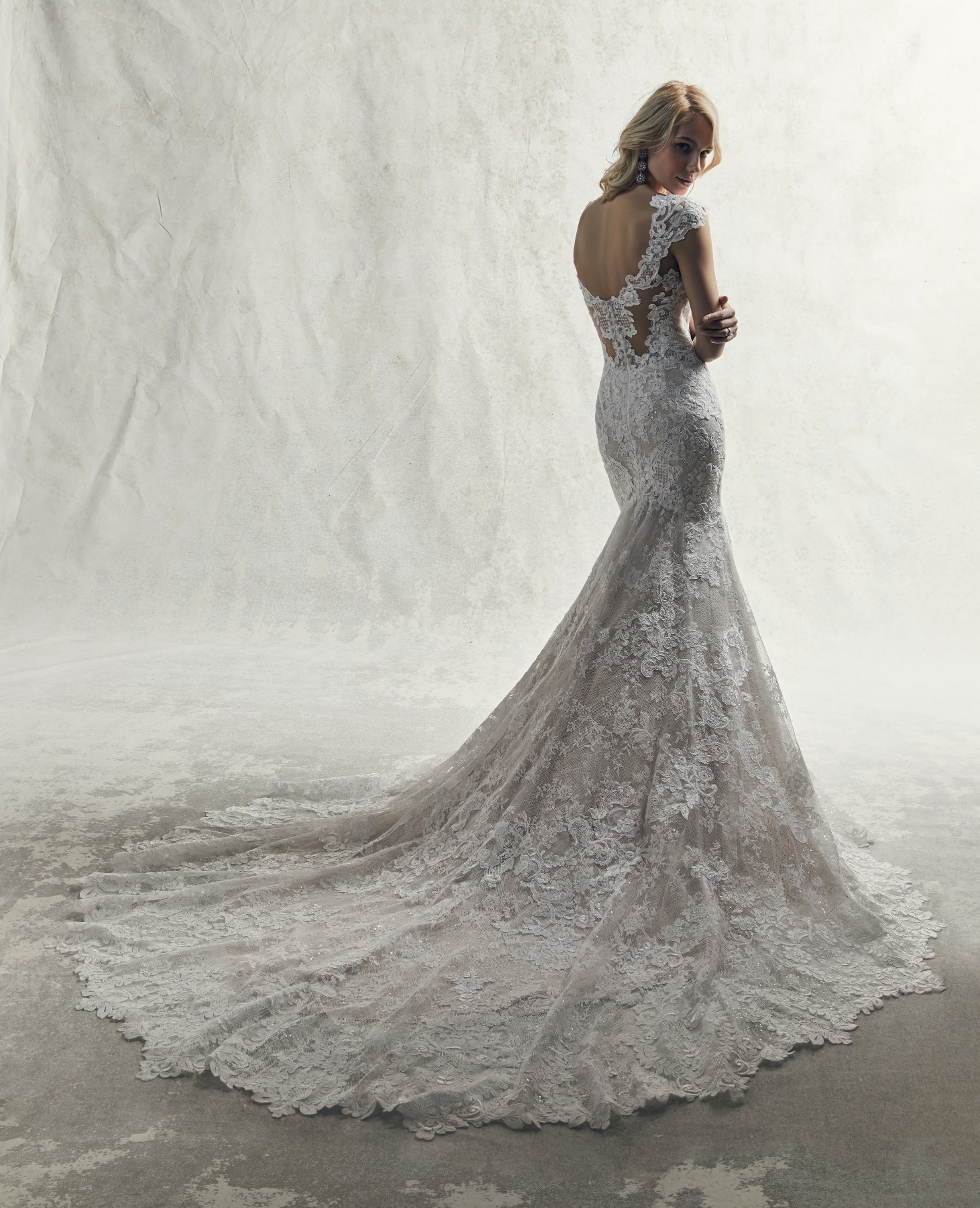 <a href="https://www.maggiesottero.com/sottero-and-midgley/chauncey/11844">Chauncey</a> Credits: Sottero & Midgley.