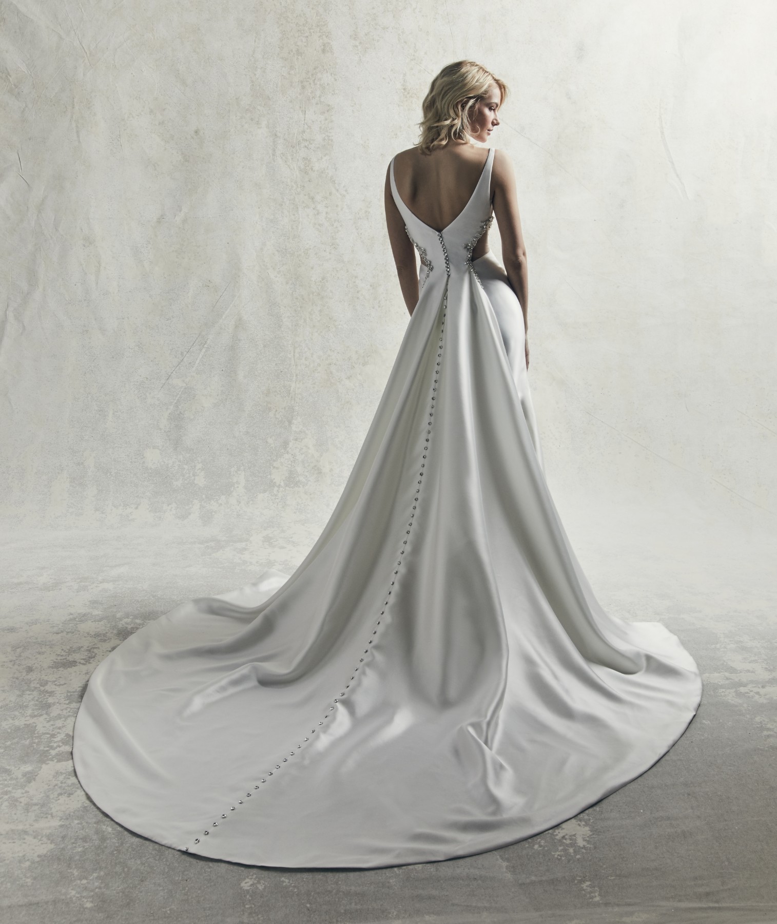<a href="https://www.maggiesottero.com/sottero-and-midgley/tyra/11865">Tyra</a> Credits: Sottero & Midgley.