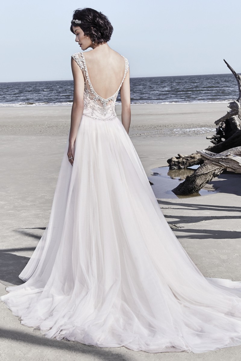 <a href="https://www.maggiesottero.com/sottero-and-midgley/ezra/11533">Maggie Sottero</a>