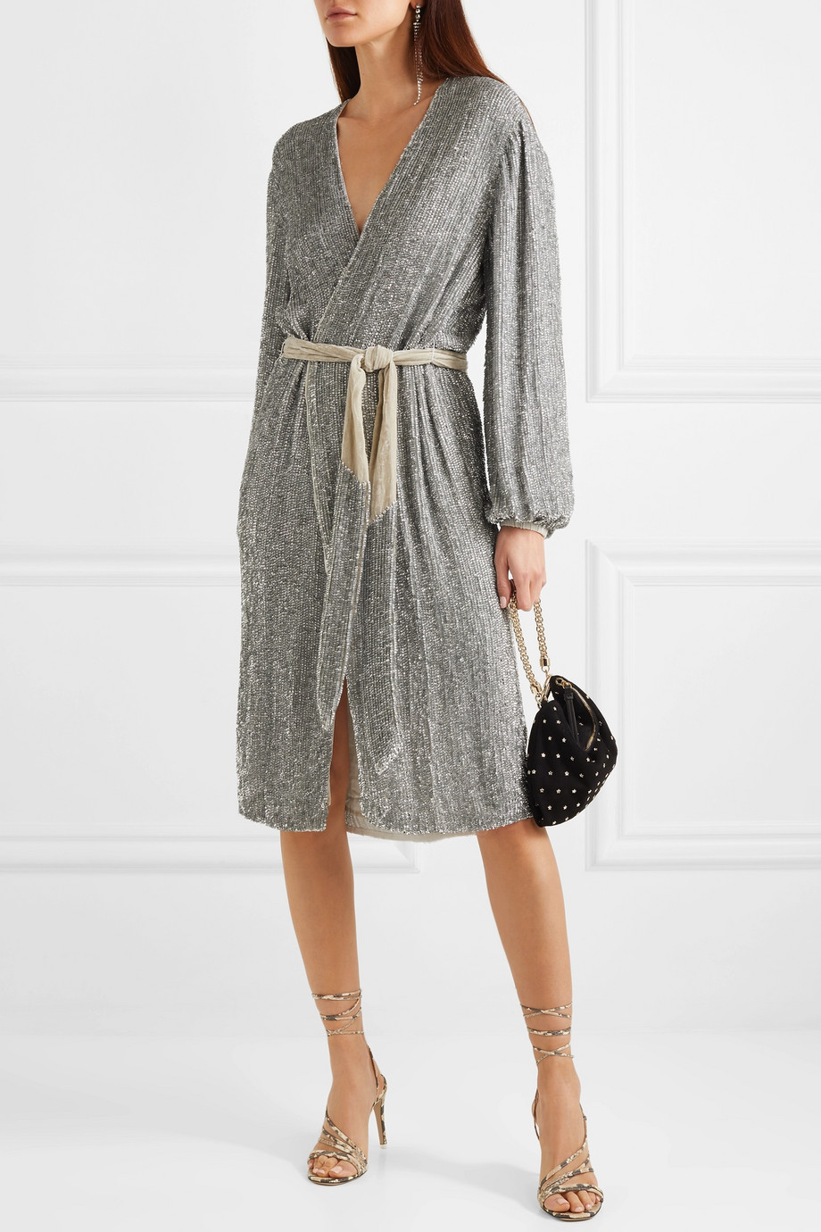 Créditos: Retrofête via Net-a-Porter